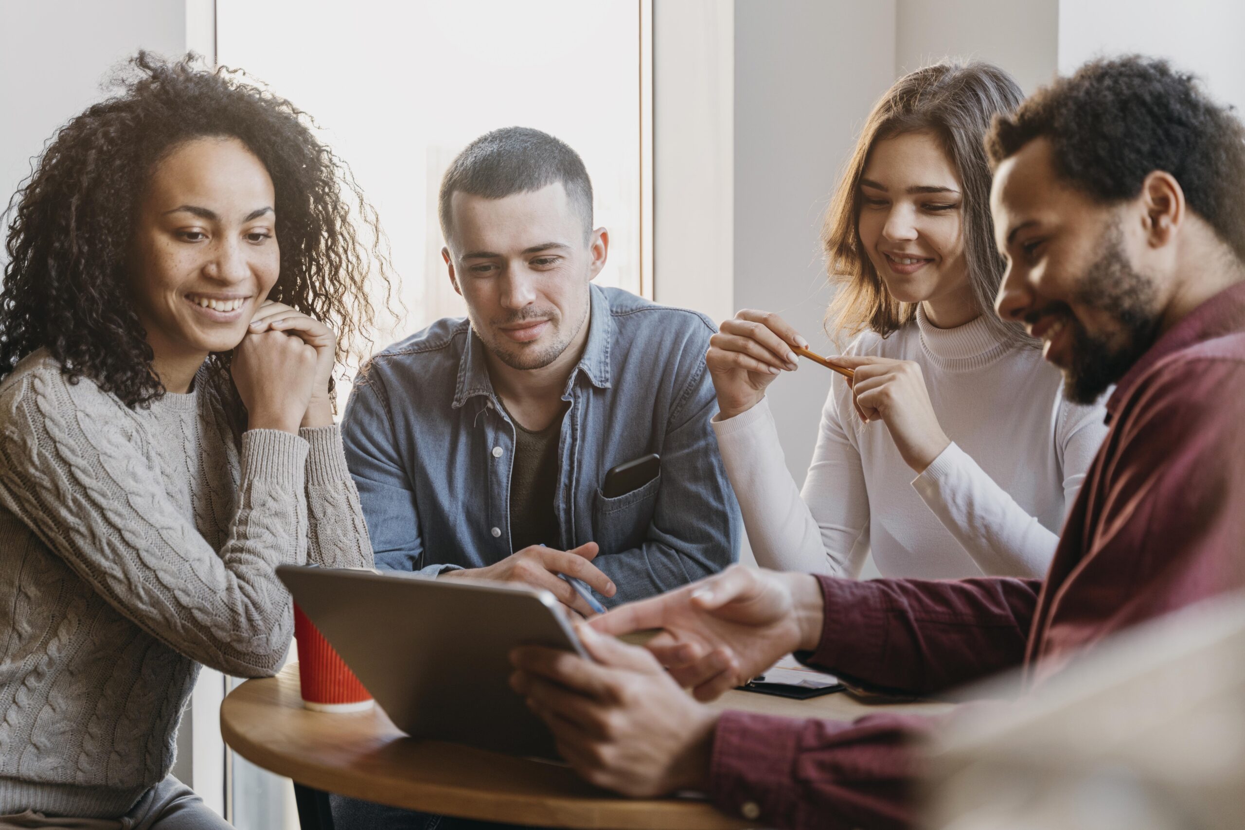 An HR team preparing for employee benefits open enrollment season.